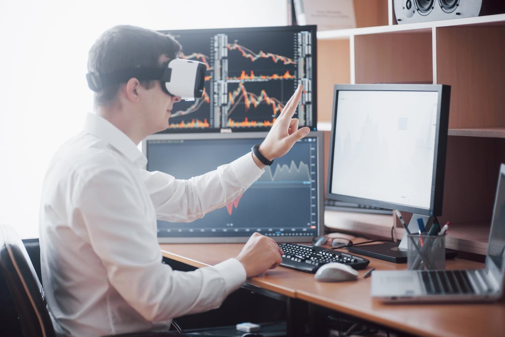 businessman-in-virtual-reality-trading-on-stock-ma-LT8BAQB